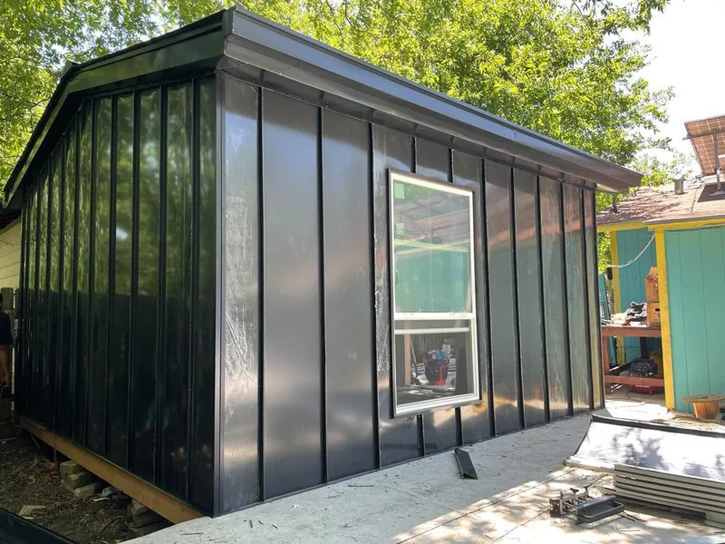 Black standing seam metal wall panels for Roof Inspection in Azalea Park
